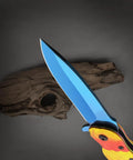 Colorful Parrot Pattern Folding Pocket Knife With Gradient Parrot-Scale Handle, 3-Inch Blue Coated Blade, side view