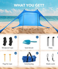 Ultra Portable Beach Tent Canopy With UPF50 Sun Protection set with sandbags, ropes, pegs, poles, and carrying bag on beach