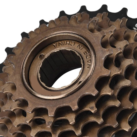 Close-up of heavy-duty steel 7 Speed Freewheel And 21 Speed Cassette Gear Set For Mountain Cross And Road Bikes, rust resistant design.