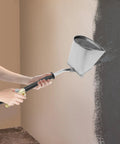 Heavy Duty Four Jet Pneumatic Cement Stucco Sprayer Gun With Upward Angle Nozzle applying texture to wall.
