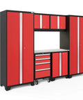 Complete 7 Piece Badass Steel Garage Storage Set With Locking Rolling Tool Chest and red cabinets with stainless steel work surface.