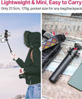 Person using Extendable Mini Camera Tripod With 4 Level Adjustments And 360 Degree Ball Head Cold Shoe Mount for travel photography.