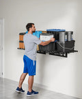 Heavy Duty Garage Wall Mount Shelving Unit 2 By 3 Feet Black 1 Pack Holds Up To 200 Lbs For Easy Organization And Storage Bins Classic Series Durable Steel Construction Easy Install Space Saving Garage Storage Solution with person organizing bins.