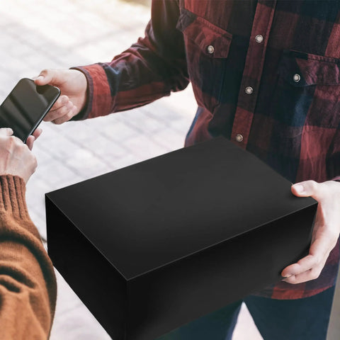 Person holding a black package in transaction, related to 100 Pcs 12 By 15.5 Inch Poly Mailer Envelopes Waterproof Self Adhesive Bags For Shipping Clothes.