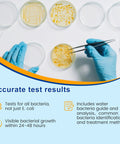Hands using tweezers with culture plates testing bacteria for Drinking Water Bacteria Test Kit With 12 Tests Detecting Coliform And E Coli.