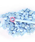 Premium PBT Keycaps With Dope Colorway And Ergonomic Arc Fit Smooth Typing Feel Hella Durable Oil Resistant Texture Perfect 108 Keys Layout For Gaming Rigs And Productivity Workstations In Light Blue Finish scattered with a keycap puller.