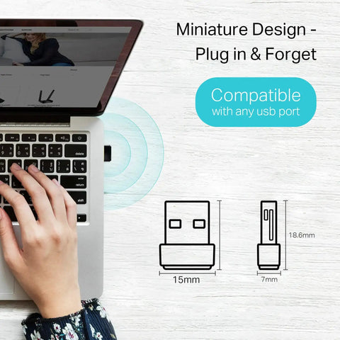 Nano AC600 USB WiFi Adapter Archer T2U Nano Dual Band inserted in laptop with hand, dimensions illustrated on side