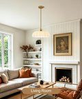 puncoll 15.7 Vintage Milk Glass Pendant Light Kitchen Island hanging in a living room with golden accents and soft glow.