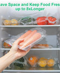 Hand holding 200 Pcs 6x10 Inch BPA Free Vacuum Sealer Bags Precut For All Vacuum Sealer Machines Keeps Food Fresh Three To Six Times Longer