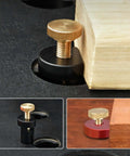 19mm Aluminum Alloy Workbench Stop with Thumb Screw in black and gold, securing a wooden workpiece for table use