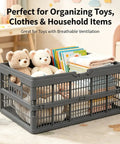 Slick Gray Foldable Storage Basket With Durable Carry Handle, 18.7 Inch Wide Collapsible Closet Bin For Bedroom Shelving And Under Bed Use, Holds Up To 26 Pounds No Sweat filled with toys, books, and blankets.