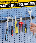 Double Sided Magnetic Tool Holder 12 Inch Magnetic Tool Bar on wall with tools like hammer, wrench, screwdrivers hanging