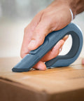 Heavy Duty Ceramic Box Cutter With Safe Zirconium Oxide Blade That Lasts 11x Longer Than Metal, Finger Friendly Edge, Slate Color, 1 Pack For Quick, Safer Package Opening used to cut a cardboard box
