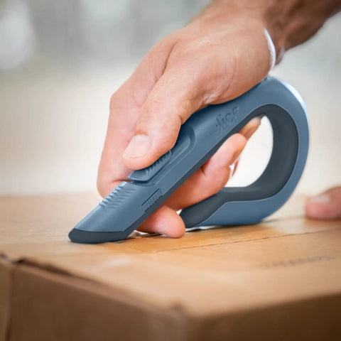 Heavy Duty Ceramic Box Cutter With Safe Zirconium Oxide Blade That Lasts 11x Longer Than Metal, Finger Friendly Edge, Slate Color, 1 Pack For Quick, Safer Package Opening used to cut a cardboard box