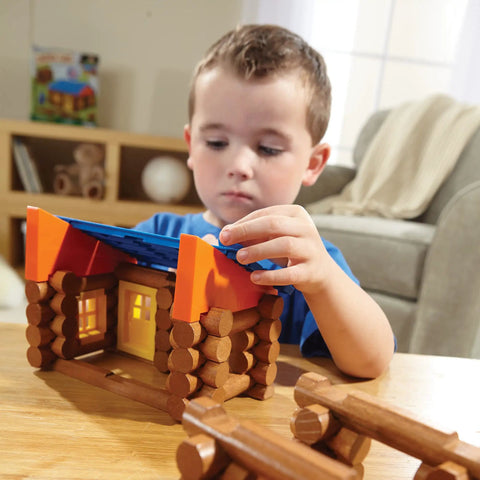 Child building with Oak Creek Lodge Wooden Building Set With 137 Real Maple Logs, Retro Construction Fun For Kids 3 Plus toy