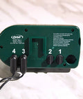 Automatic Yard Watering System With Four Station Sprinkler Setup showing back view of four-port manifold on marble surface