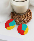 Lowkey Fresh Irregular Grid Pattern Dangle Earrings For Women Crafted From Smooth Pvc Leather Featuring Ultra Lightweight Silver Plated Hooks Comfortable For Sensitive Ears Daily Streetwear Vibe Essential Gear on a decorative coaster.