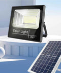 JUDYSSY Led Flood Light Outdoor, with Remote Control Solar Dusk to Dawn Solar Flood Light suitable for yards, showing solar panel and light.