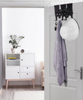 Black Cat Over The Door Hanger Set With Three Kittens And Six Paw Hooks Metal Coat Rack holding hat and towel on a door