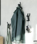 Buddy Wall Hooks Set of 3 Fun, Cool, Decorative Wall Mounted Coat Hooks in black holding jacket and camera
