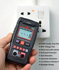 Person using 4000 Count Digital Multimeter With Backlit Display Auto Range Handheld Tester For AC And DC Voltage Measurement
