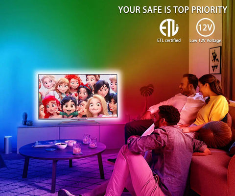 Family enjoying Ultra Long 32.8ft RGB Led Strip Lights Kit illuminating TV background in cozy living room