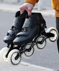 Person holding Carbon Fiber Inline Speed Skates 3x110mm With ABEC-9 Bearings Lightweight PU Wheels for Outdoor Fitness and Street Racing.