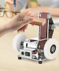 Slick 3 In 1 Mini Belt Sander And Electric Grinder With 7 Speed Adjustable Benchtop Station For Woodworking, user grinding wood.