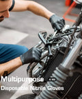 Mechanic using Textured Nitrile Exam Gloves Latex Free And Powder Free 5 Mil Non Sterile Disposable Gloves for bike repair.