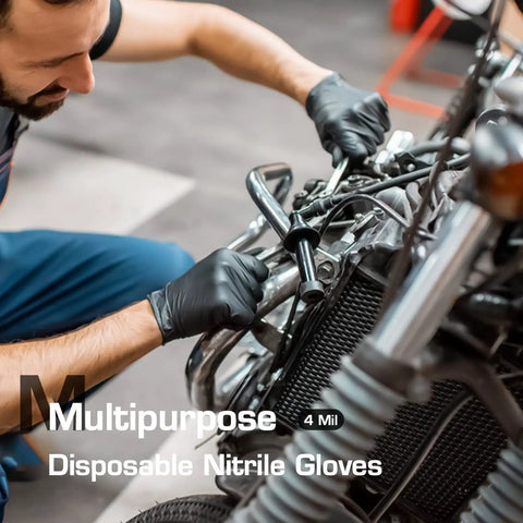 Mechanic using Textured Nitrile Exam Gloves Latex Free And Powder Free 5 Mil Non Sterile Disposable Gloves for bike repair.