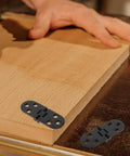 6 Pack Concealed Aluminum Alloy Door Hinges For Folding Tables And Cabinets Black Finish shown with wood surface