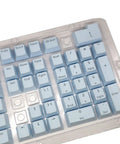 Premium PBT Keycaps With Dope Colorway And Ergonomic Arc Fit Smooth Typing Feel Hella Durable Oil Resistant Texture Perfect 108 Keys Layout For Gaming Rigs And Productivity Workstations In Light Blue Finish close-up view of light blue keyboard keys.