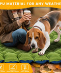 Person with coffee and dog sitting on Ultralight Inflatable Camping Pad With Pillow And Built In Foot Pump, 4 Inch Thick Comfort.