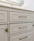 Bathroom cabinet with Set Of Six Gold Finish Cast Iron Crescent Moon Face Drawer Pulls For Celestial Decor installed.