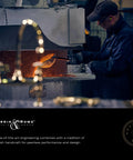 Craftsman working with molten brass, creating Edwardian Widespread Bridge Kitchen Faucet With Side Spray In Pure Unlacquered Brass.