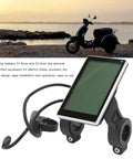 M5 LCD Waterproof Bike Display Panel For Electric Bike And Scooter Conversion, mounted on beach background