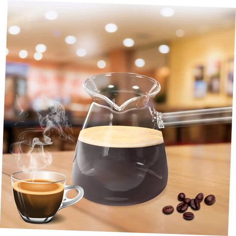 Side Handle Turkish Cezve Coffee Pot With Clear Glass Butter Pan High Borosilicate Heat Resistant Up To 100 Celsius V Shaped Outlet Coffee Warmer Decaf Friendly Arabic Turkish Brew Kit With Espresso Cups on wooden table.