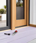 Heavy Duty Sliding Barn Door Wheels And Silent Nylon Rollers With Built Tough Cold Rolled Steel Frame For Silky Smooth Glide on patio door setup with tools.