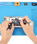 Hands repairing phone on Soldering Mat Silicone Repair Mat Non Slip Heat Resistant To 932 Fahrenheit For Electronics Repair