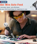 Person using Auto Feed Soldering Gun Kit With LCD Display And Hands Free Operation Plus Minus 1C Precision Temperature Control