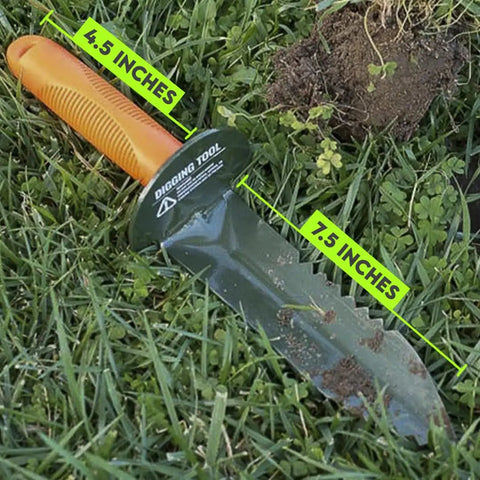Prospector's Serrated Edge Digger Compact Shovel with 7.5in carbon steel blade and orange grip shown in grass.