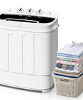 No Sweat Compact 13 Pound Twin Tub Washing Machine Portable Washer And Spin Cycle Combo next to neatly stacked freshly laundered clothes.