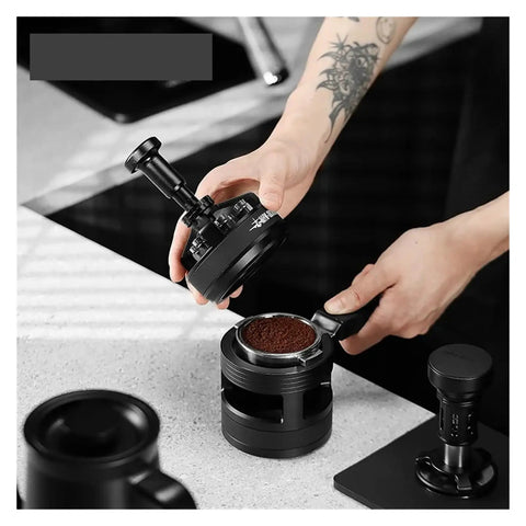 Pro Level 58mm Adjustable Espresso Puck Distribution Tool For Standard Portafilters being used to distribute coffee grounds.