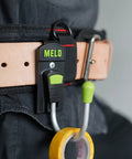 180 Degree Rotating Cordless Drill Holster Hook With Foldaway Design on leather tool belt, holding a yellow tool