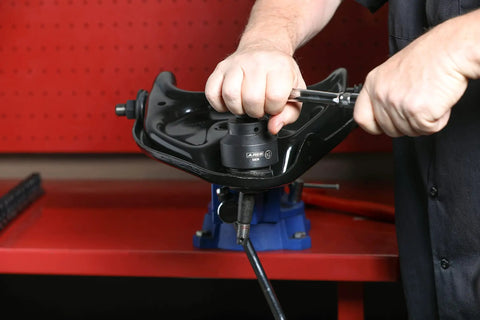 Mechanic using 3 Piece Ball Joint Socket Set, 3/4 Inch Drive, For Chrysler Dodge Jeep on suspension part