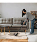 Woman using Extension Wand Replacement For Cordless Vacuums Compatible With V15 V15S V11 V10 V8 V7 Detect Absolute Cyclone.
