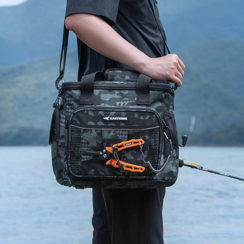 Person holding BaitSpace Tackle Bag With Four Tackle Boxes, Removable Bait Binder by a lake, showing heavy duty nylon build.