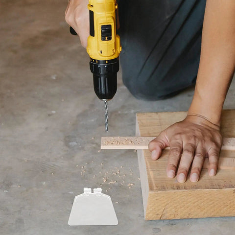 Clear Eye Safety Guard For Bench Grinders with dust shield laying beside a person using a drill on wood.