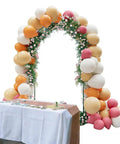 Heavy Duty Metal Garden Arch Trellis With Dual Planter Boxes For Climbing Plants In The Yard decorated with balloons and flowers