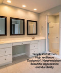 Modern bathroom with double vanity and mirrors, showcasing cabinet doors with silicone hole plugs installed for a seamless look.